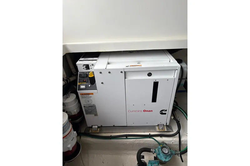  Yacht Photos Pics Cummins Onan generator in 2013 Back Cove 34 boat engine room.