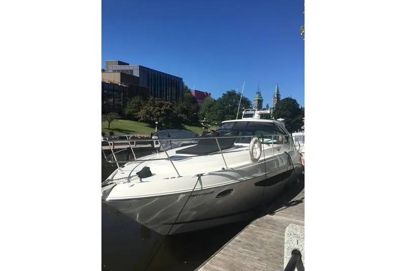  Yacht Photos Pics 2014 Sea Ray 410 Sundancer yacht docked on a sunny day.