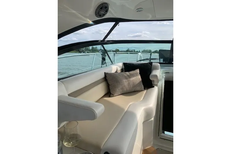  Yacht Photos Pics Luxurious seating area on 2014 Sea Ray 410 Sundancer yacht with scenic water view.