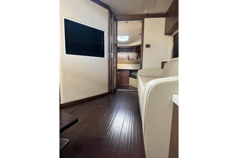  Yacht Photos Pics Interior of 2014 Sea Ray 410 Sundancer yacht, featuring modern design and comfortable seating.