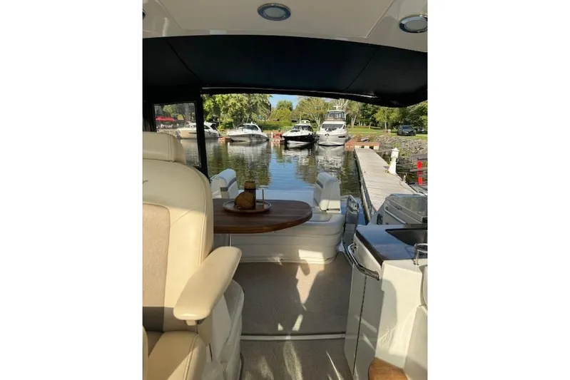  Yacht Photos Pics Interior view of 2014 Sea Ray 410 Sundancer yacht docked at marina.