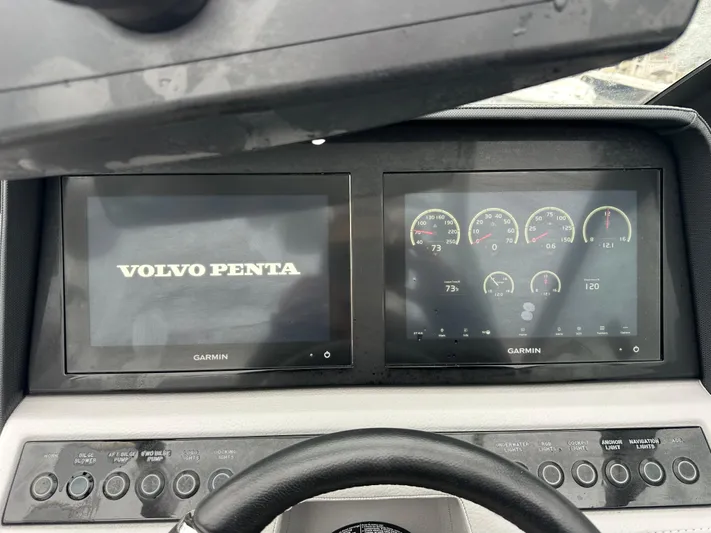  Yacht Photos Pics Dashboard of 2022 Cobalt R8 Surf boat with Garmin displays and Volvo Penta interface.