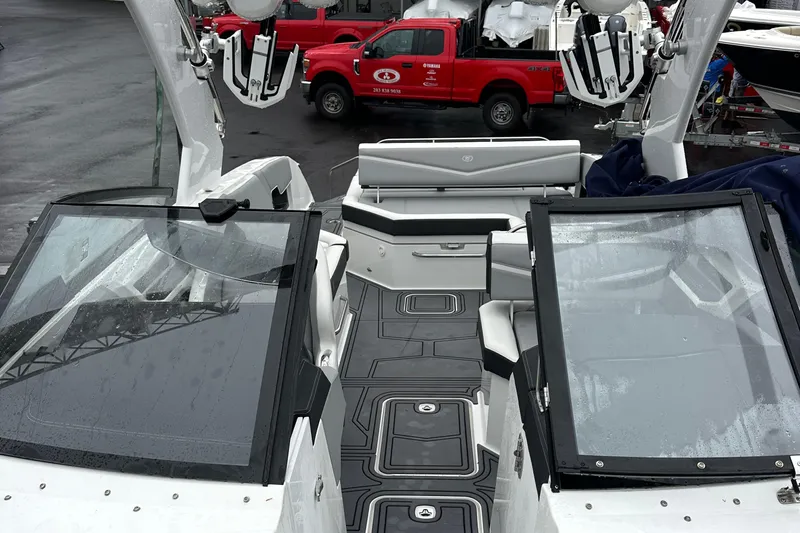  Yacht Photos Pics 2022 Cobalt R8 Surf boat interior with sleek design and modern features.