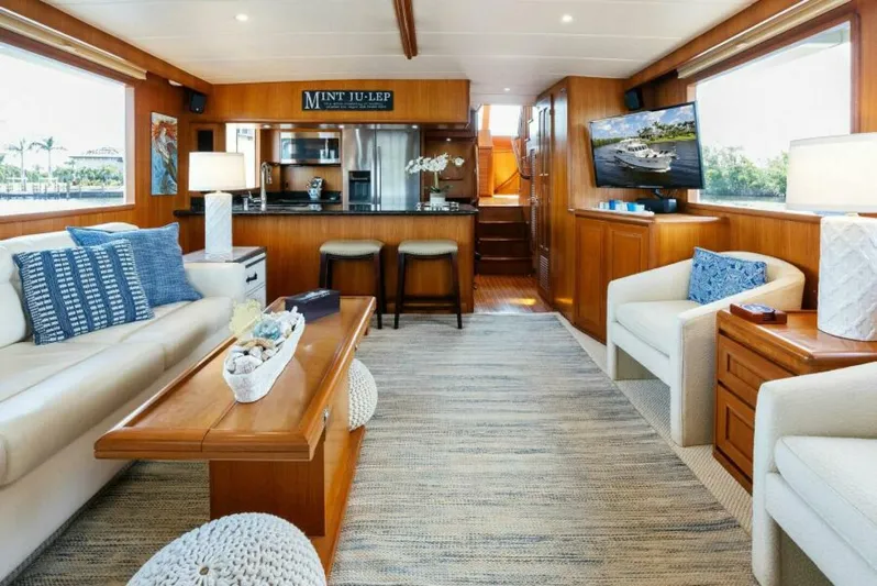 Orion II Yacht Photos Pics Luxurious interior of 2001 Grand Alaskan 64 Pilot House yacht with elegant furnishings.