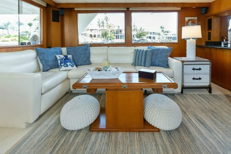 Orion II Yacht Photos Pics Luxurious interior of 2001 Grand Alaskan 64 pilot house with elegant seating and decor.