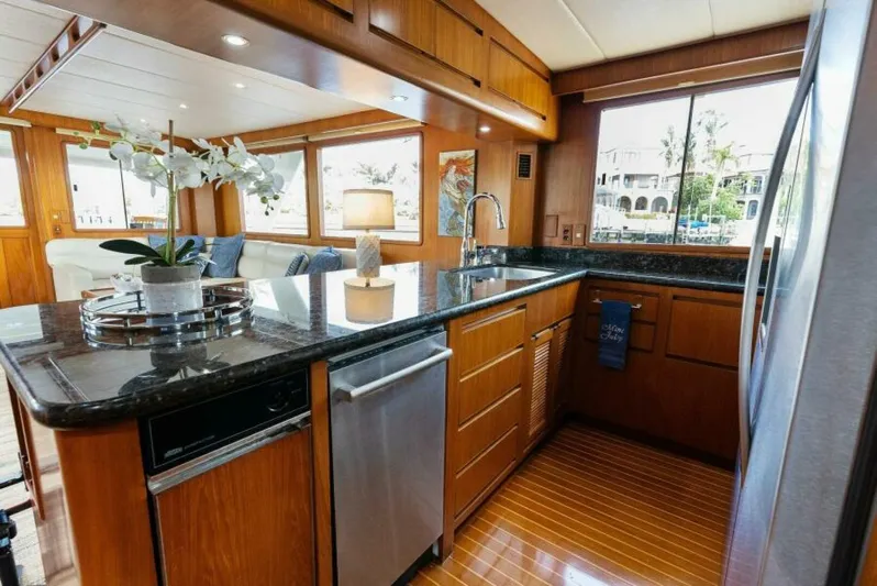 Orion II Yacht Photos Pics Luxurious kitchen interior of 2001 Grand Alaskan 64 Pilot House yacht.