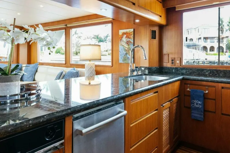 Orion II Yacht Photos Pics Luxurious kitchen interior of 2001 Grand Alaskan 64 Pilot House yacht.