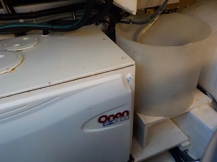 " Sarah Jane " Yacht Photos Pics Onan generator in the engine room of 2006 Tiara Yachts 4400 Sovran.
