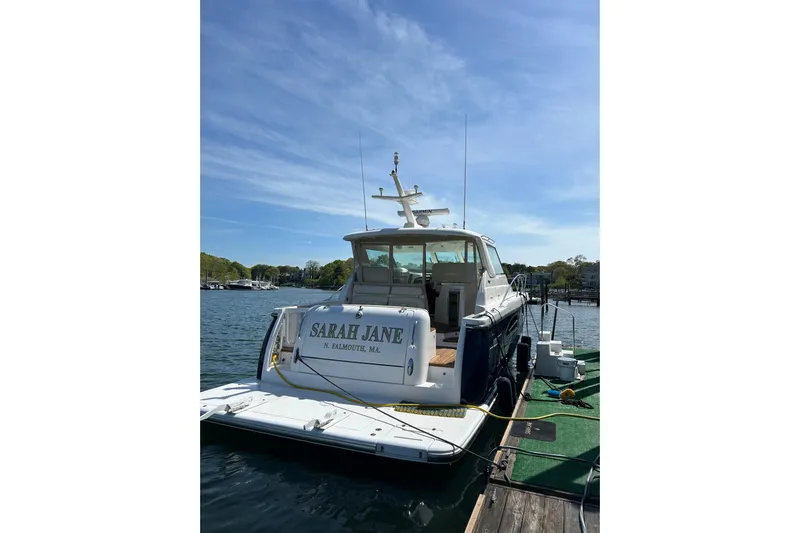 " Sarah Jane " Yacht Photos Pics 2006 Tiara Yachts 4400 Sovran docked, rear view with clear sky.