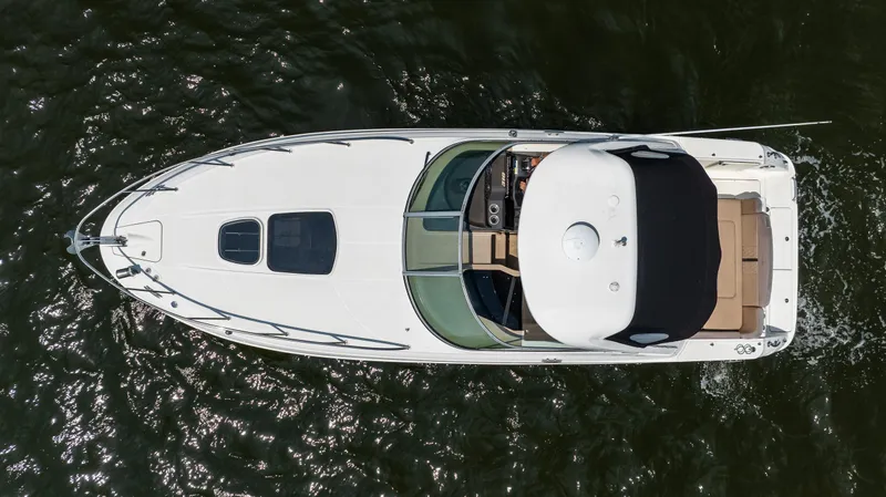  Yacht Photos Pics Aerial view of 2016 Sea Ray 310 Sundancer boat on water.