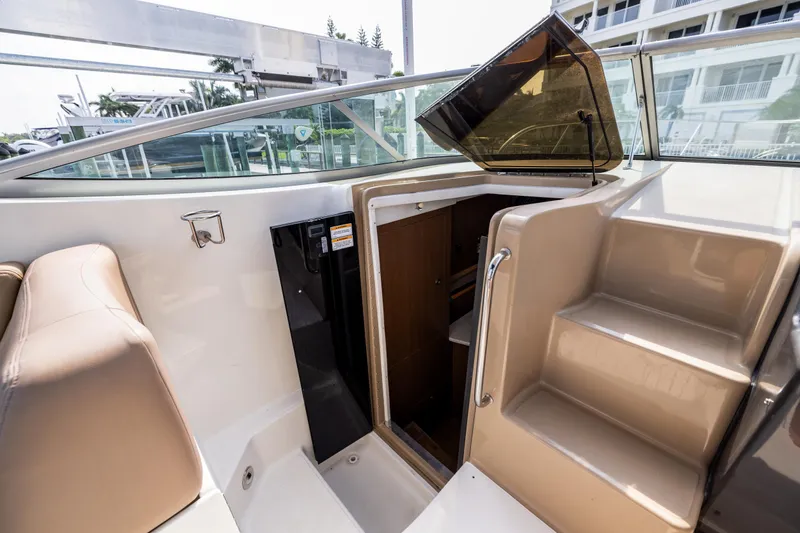  Yacht Photos Pics 2016 Sea Ray 310 Sundancer cabin entrance with stairs and seating area.
