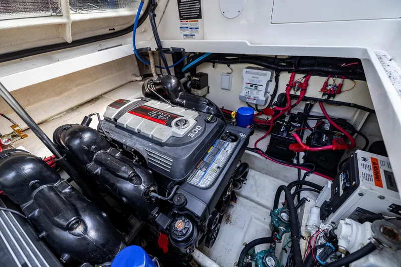 Yacht Photos Pics Engine compartment of 2016 Sea Ray 310 Sundancer with visible wiring and components.
