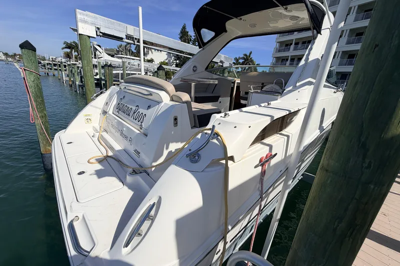  Yacht Photos Pics 2016 Sea Ray Sundancer 310 docked at a marina, featuring a spacious deck and sleek design.