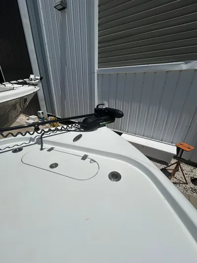  Yacht Photos Pics 2021 Yellowfin 24 Bay CE boat deck with trolling motor.