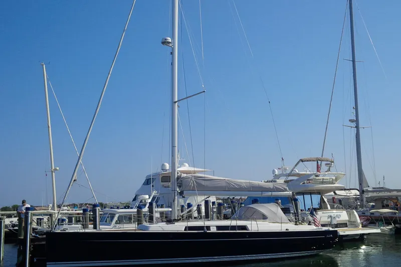 Animal Spirits Yacht Photos Pics 2014 Hanse Yachts 445 sailboat docked in a marina under clear blue sky.