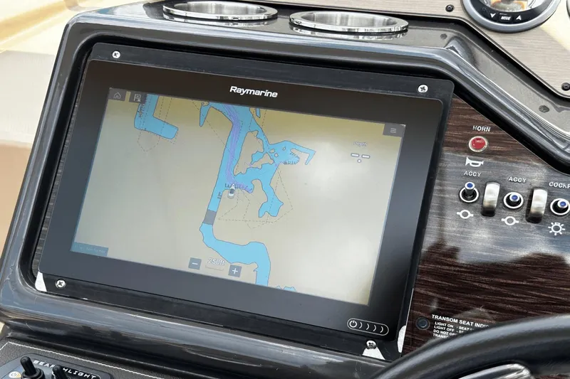 Parce Yacht Photos Pics Raymarine navigation display on 2016 Sea Ray 310 Sundancer boat dashboard.