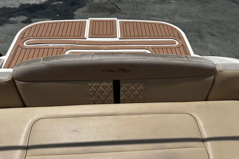 Parce Yacht Photos Pics 2016 Sea Ray 310 Sundancer boat with tan seating and teak-style swim platform.