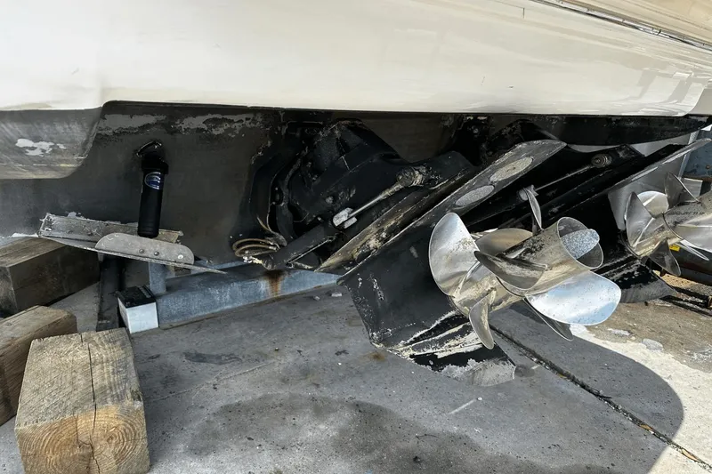 Parce Yacht Photos Pics 2016 Sea Ray 310 Sundancer boat propellers and stern drive on dry dock.