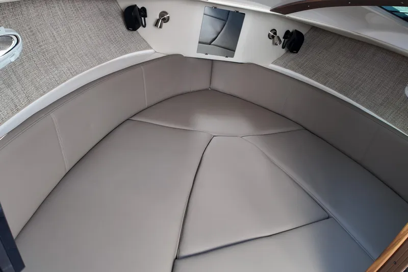  Yacht Photos Pics Interior cabin of 2026 Solara S-250 Coupe with sleek, modern design and comfortable seating.