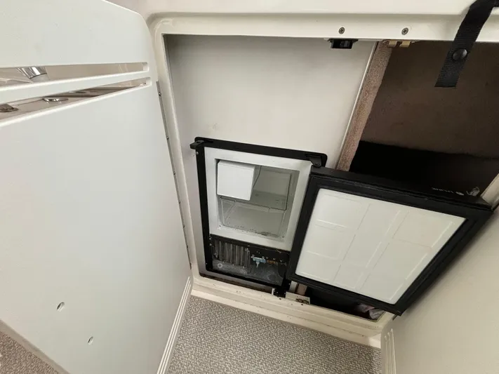  Yacht Photos Pics 1998 Sea Ray 400 Sundancer interior fridge compartment, open door view.