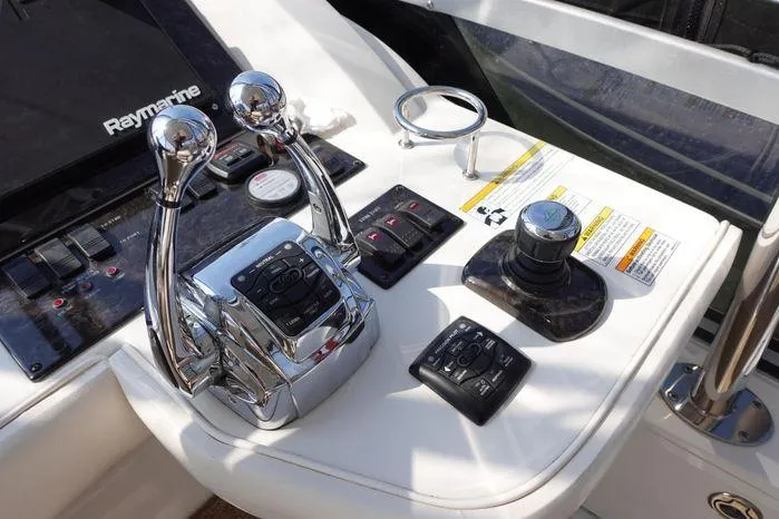  Yacht Photos Pics Control panel of 2012 Sea Ray 450 Sedan Bridge with Raymarine equipment.