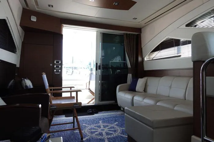  Yacht Photos Pics Luxurious interior of 2012 Sea Ray 450 Sedan Bridge yacht with modern furnishings.