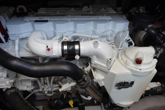  Yacht Photos Pics Engine of 2012 Sea Ray 450 Sedan Bridge, showcasing intricate mechanical components.