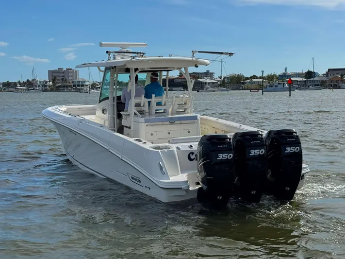 Crews Ship Yacht Photos Pics 2015 Boston Whaler 350 Outrage boat with triple 350 engines on the water.
