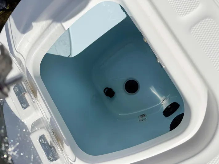 Crews Ship Yacht Photos Pics Open storage compartment on 2015 Boston Whaler 350 Outrage boat.