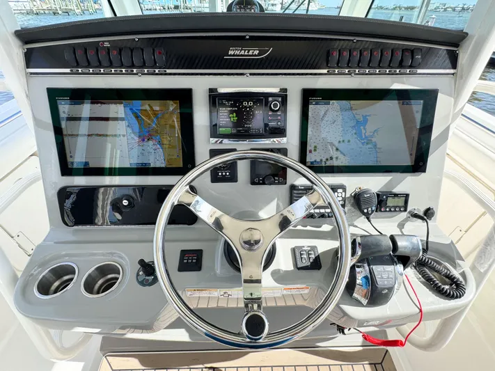 Crews Ship Yacht Photos Pics 2015 Boston Whaler 350 Outrage helm with dual navigation screens and controls.