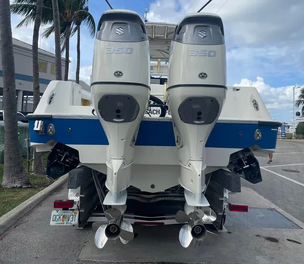 El Gringo Yacht Photos Pics 2004 Hydra-Sports 3300 CC boat with dual 350 horsepower engines, parked on a trailer.