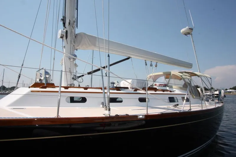 Regulus Yacht Photos Pics 1993 Hinckley Sou'wester 51 sailboat with sleek design and elegant deck features.