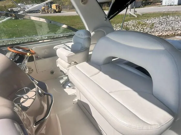  Yacht Photos Pics Interior of 2000 Sea Ray 410 Sundancer boat with white leather seating.