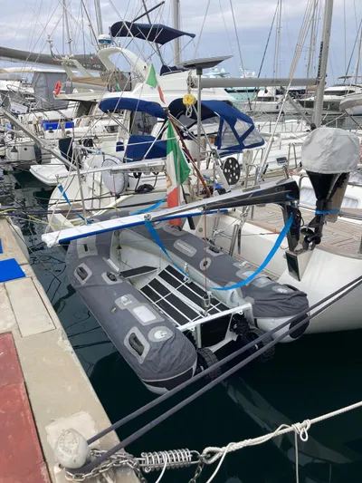 Morgan's Moon Yacht Photos Pics 2008 Hallberg-Rassy 43 yacht docked with inflatable dinghy at marina.