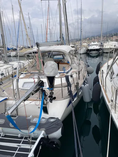Morgan's Moon Yacht Photos Pics 2008 Hallberg-Rassy 43 yacht docked in a marina, surrounded by other boats.