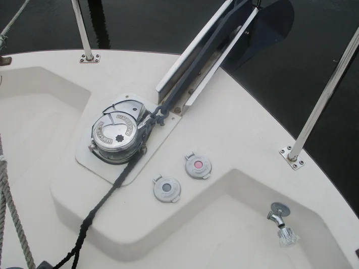 Charley's Tern Yacht Photos Pics 1998 Nordic Tug 32 boat deck with winch and cleats.