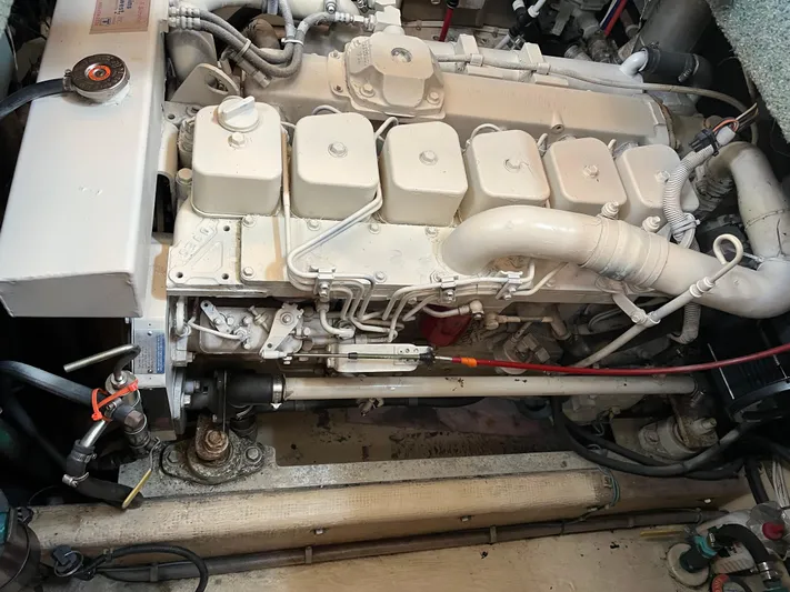 Charley's Tern Yacht Photos Pics Engine compartment of a 1998 Nordic Tug 32, showcasing detailed mechanical components.