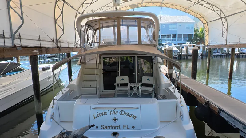 Livin' The Dream Yacht Photos Pics 2001 Sea Ray 450 Express Bridge docked in St. Petersburg, FL marina.