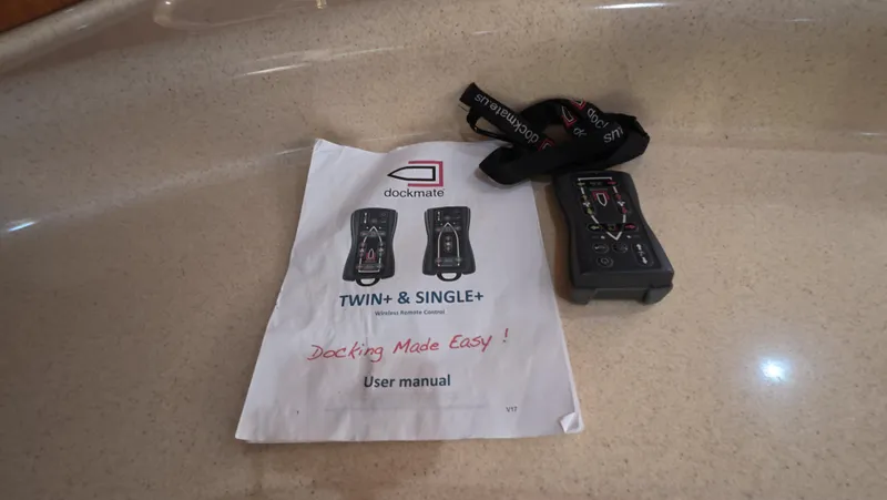 Livin' The Dream Yacht Photos Pics Dockmate remote control and user manual on Sea Ray 450 Express Bridge, 2001 model.