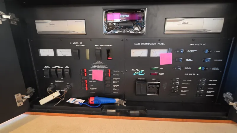 Livin' The Dream Yacht Photos Pics Electrical control panel of a 2001 Sea Ray 450 Express Bridge yacht.