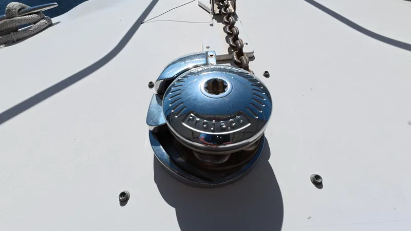 Livin' The Dream Yacht Photos Pics Anchor windlass on 2001 Sea Ray 450 Express Bridge yacht deck.
