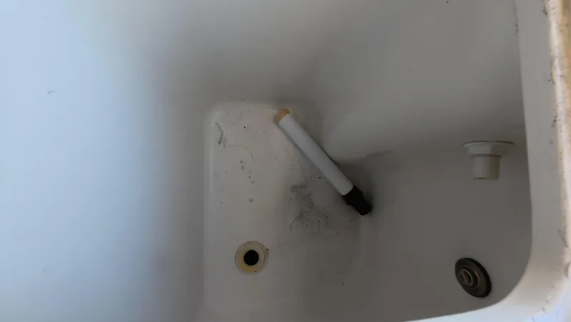 Livin' The Dream Yacht Photos Pics White compartment interior of 2001 Sea Ray 450 Express Bridge boat.