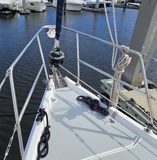  Yacht Photos Pics Bow of 2005 Hunter 456 sailboat docked at marina, featuring stainless steel railings.