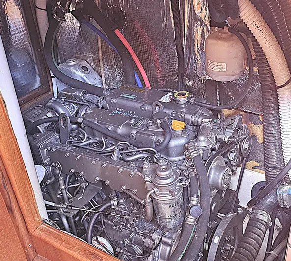  Yacht Photos Pics Engine compartment of a 2005 Hunter 456, showcasing detailed mechanical components.