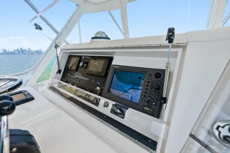 Mr. Bond Yacht Photos Pics Control panel of a 2006 Bertram 39 Convertible yacht with navigation equipment.