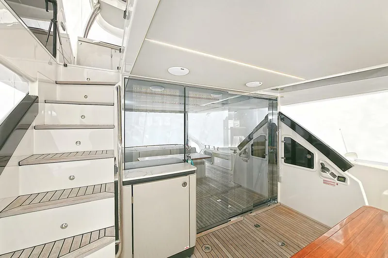  Yacht Photos Pics Luxurious interior of 2022 Absolute 62 Fly yacht with modern design and spacious layout.