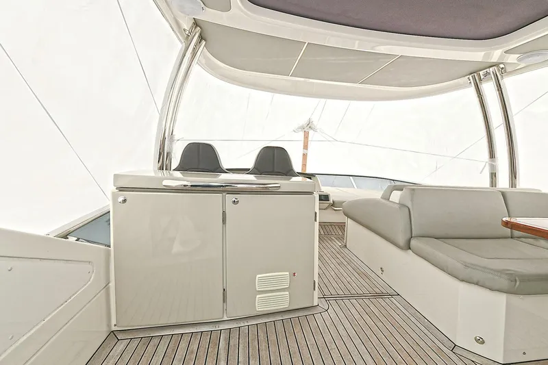  Yacht Photos Pics Luxurious interior of 2022 Absolute 62 Fly yacht with sleek seating and modern design.