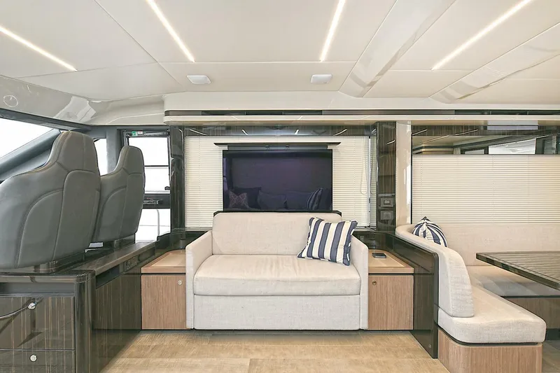  Yacht Photos Pics Luxurious interior of 2022 Absolute 62 Fly yacht with modern seating and elegant design.