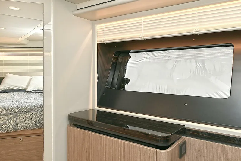  Yacht Photos Pics Interior of 2022 Absolute 62 Fly yacht with modern design and window view.