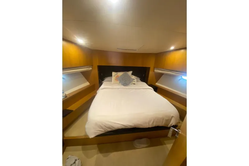  Yacht Photos Pics Luxurious bedroom interior of 2011 Sanlorenzo SL62 yacht with cozy bedding.